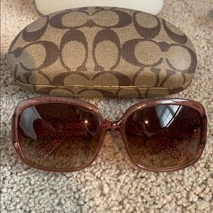 Pink sunglasses by Coach